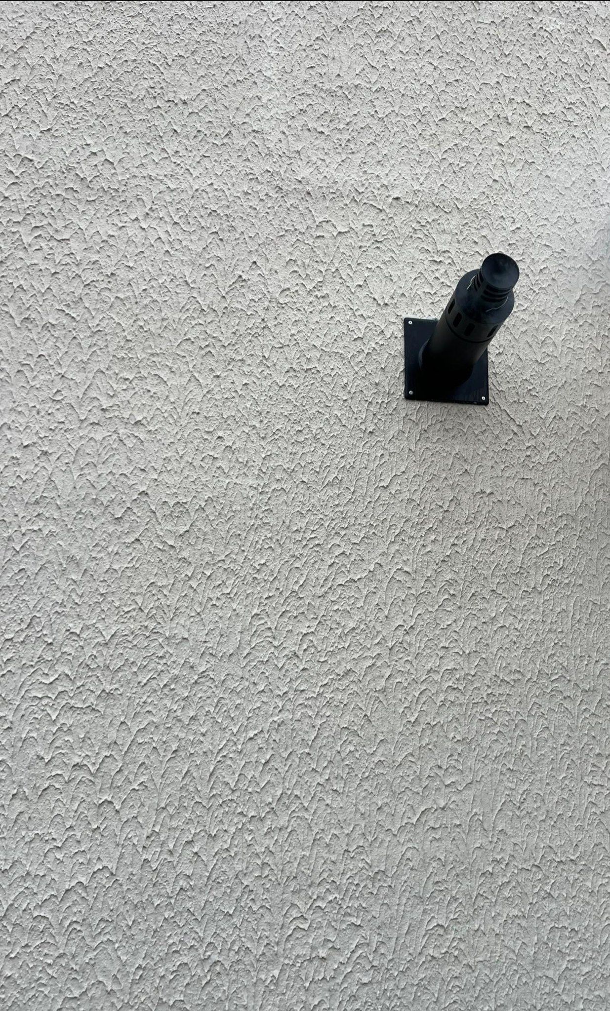 Sortie de fumée pour poêle sur façade