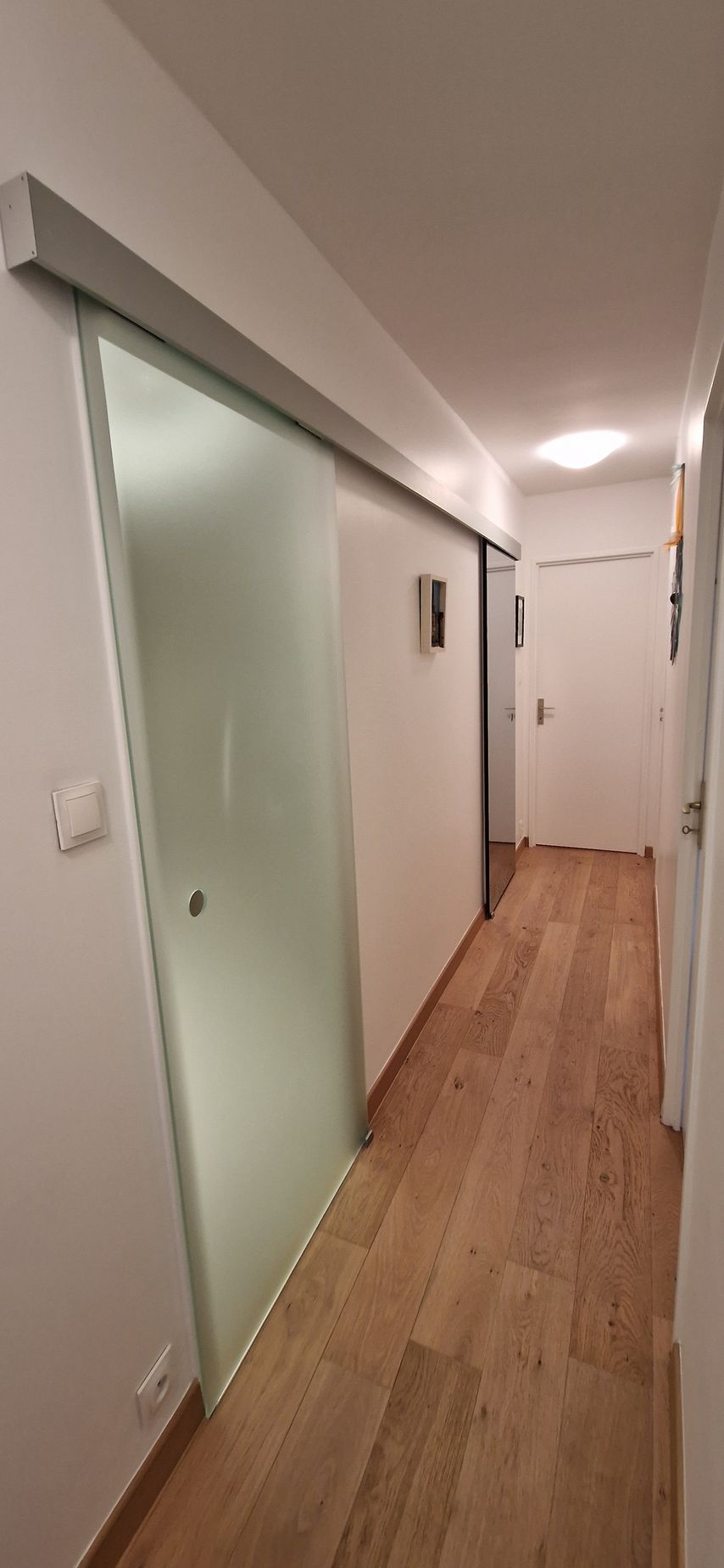 Porte en verre coulissante