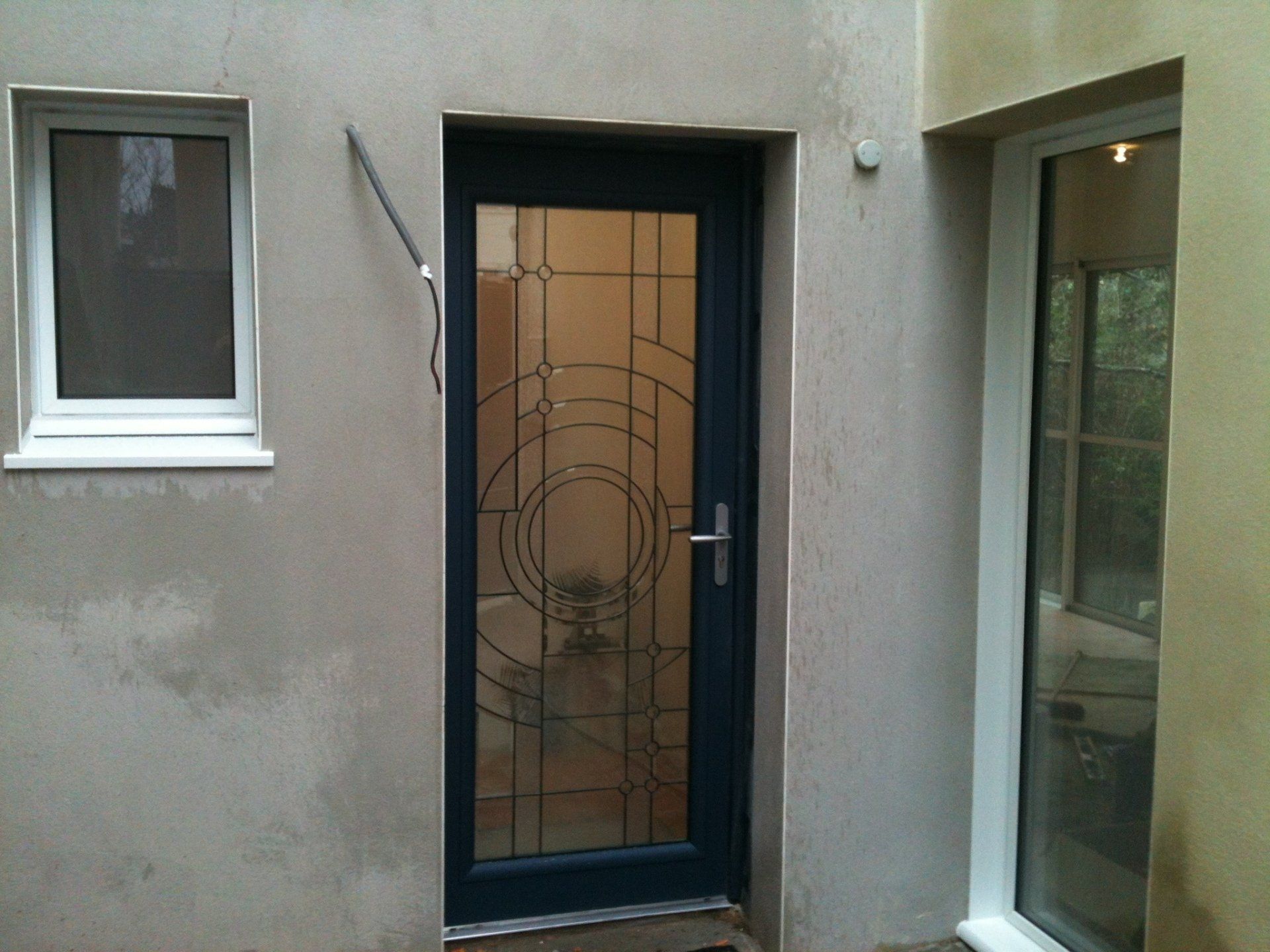 Porte d'entrée vitrée