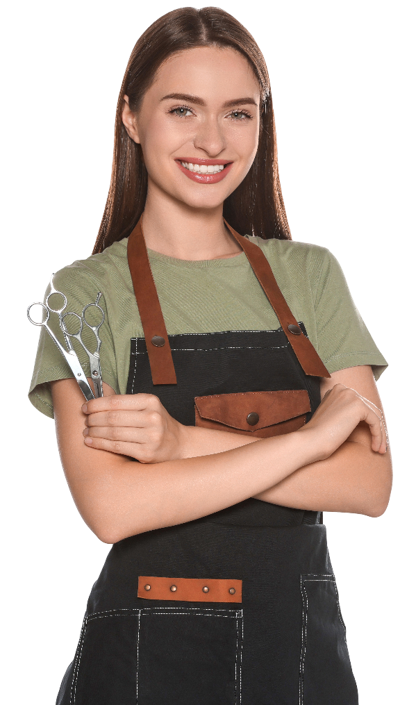 Une coiffeuse avec 2 paires de ciseaux dans les mains
