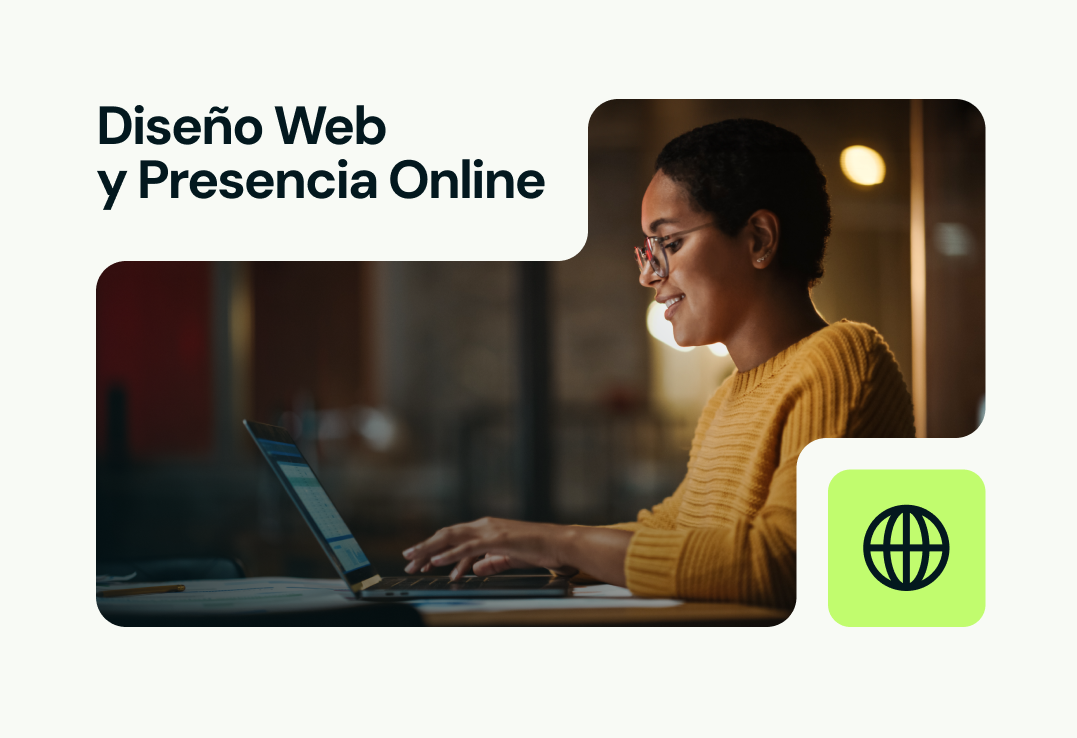 Una mujer está sentada en una mesa usando una computadora portátil.