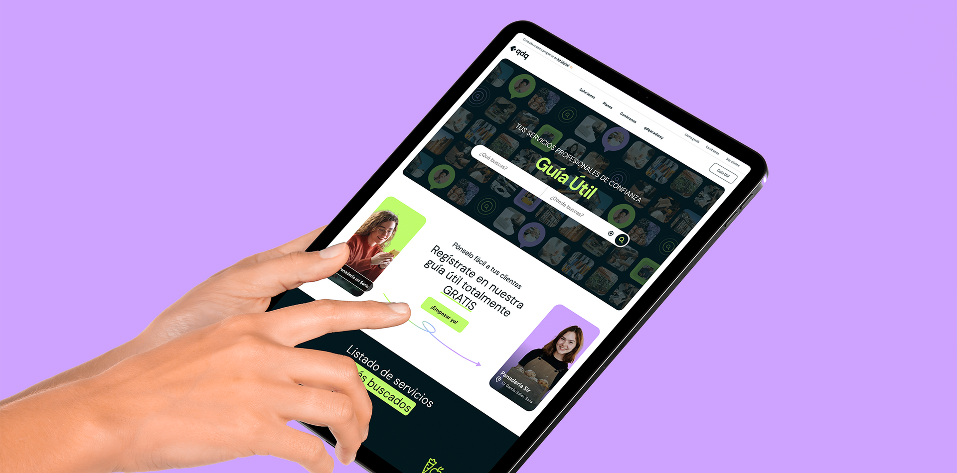 A person is holding a tablet with a website on it.