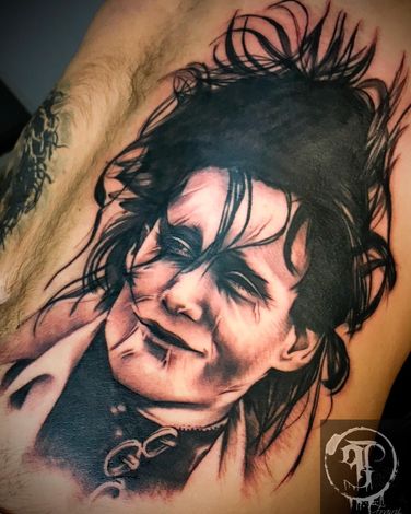 ein schwarz-weißes Tattoo eines Mannes Paint Temptation Uelzen