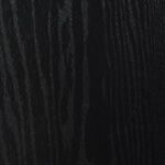 A close up of a black wood grain texture.