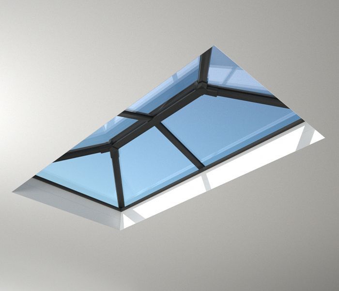 A triangle shaped skylight with a blue glass roof