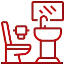 Un icono de línea roja de un inodoro, lavabo y espejo.