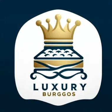 Logotipo de Luxury Burggos: corona dorada sobre una cama estilizada con el texto "LUXURY BURGGOS".