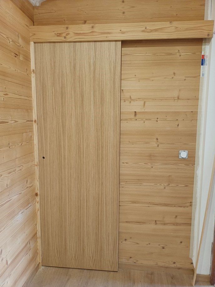 Porte coulissante stratifiée