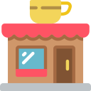 Café mit roter Markise, brauner Fassade und gelber Kaffeetasse auf dem Dach.