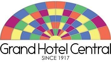 Een kleurrijk logo voor grand hotel central sinds 1917.