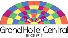 Een kleurrijk logo voor grand hotel central sinds 1917.