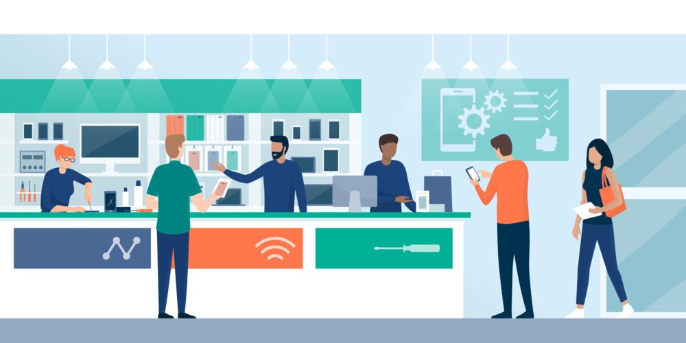 Un grupo de personas está de pie alrededor de un mostrador en una tienda de teléfonos celulares.