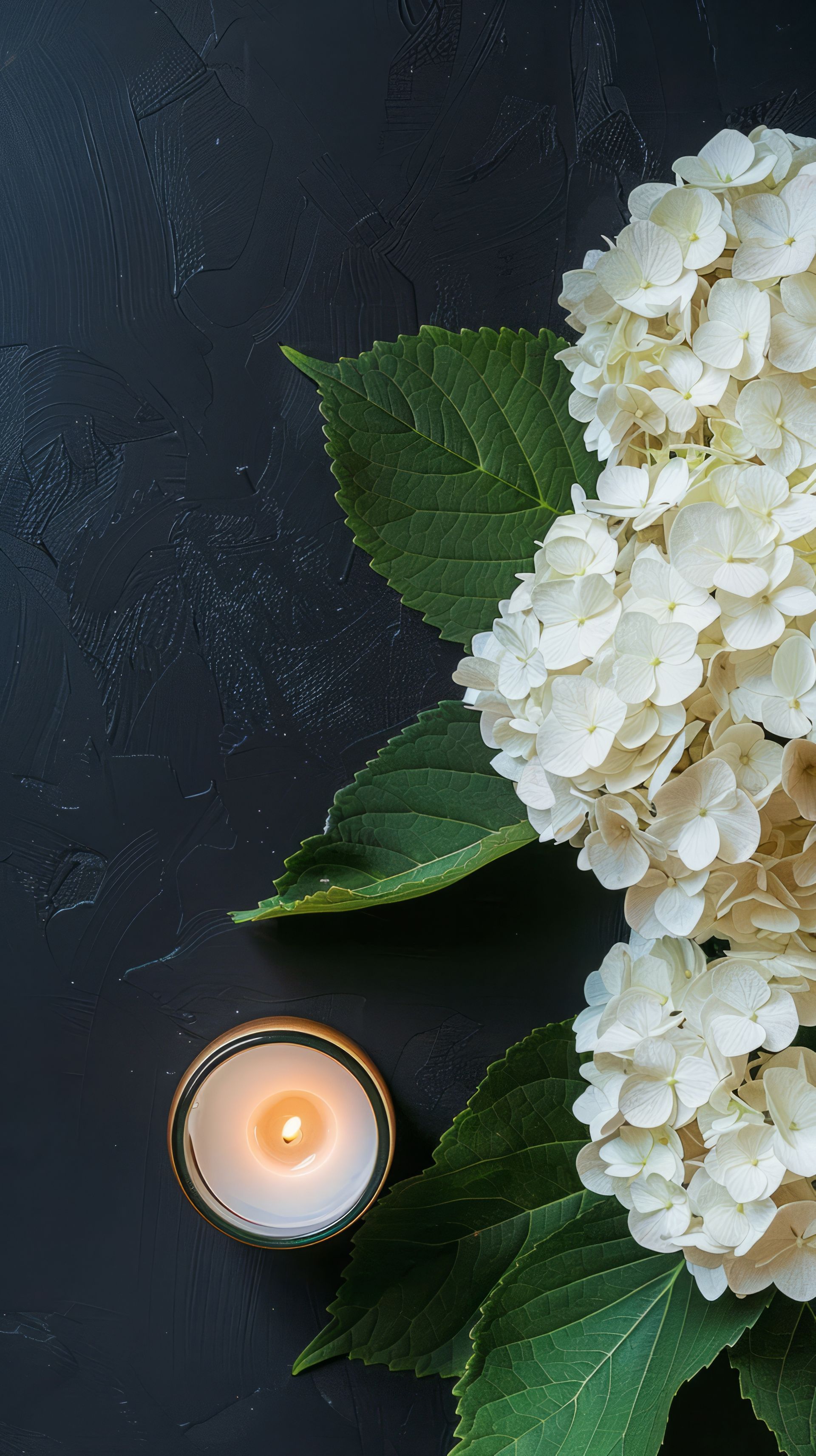 Des fleurs et une bougie