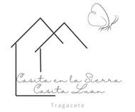 Un logotipo en blanco y negro para una casa con una mariposa encima.