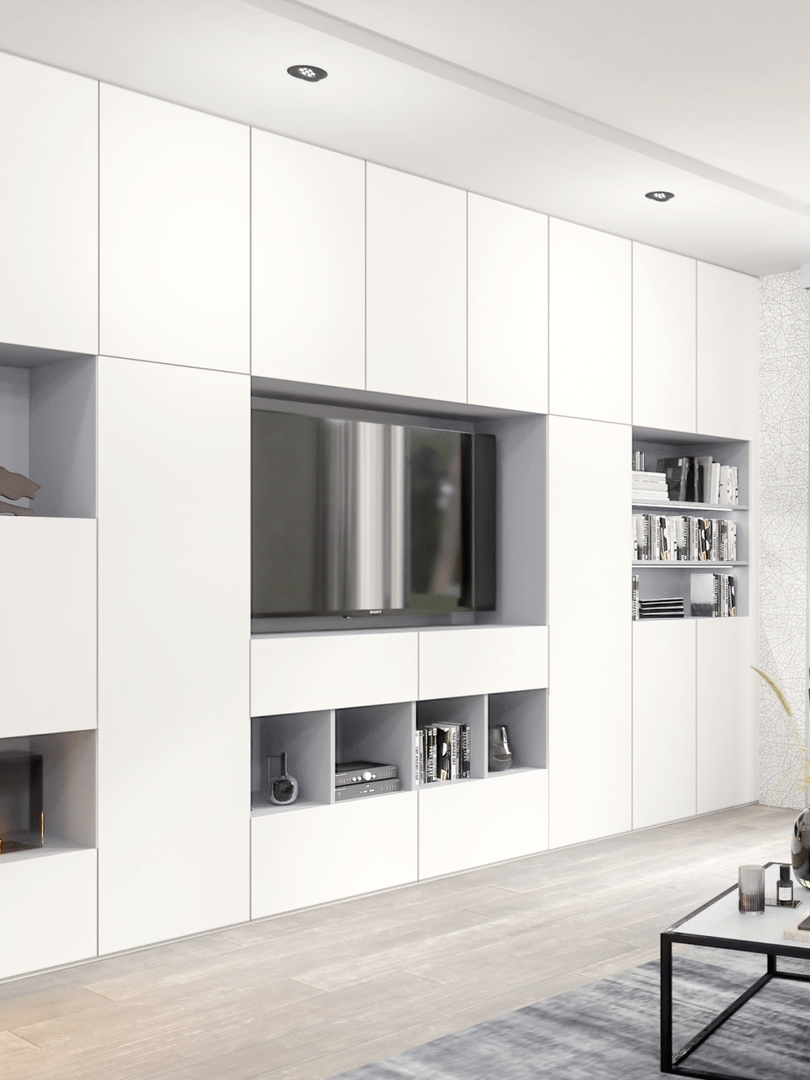 TV noire posée dans un meuble blanc pour TV