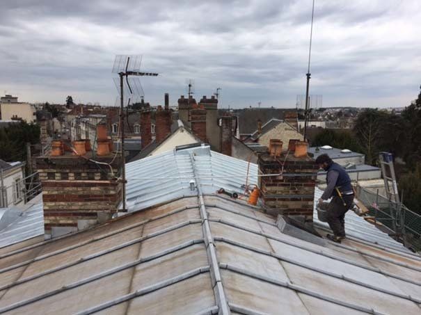 Rénovation de toiture terrasse à tasseaux en zinc naturel