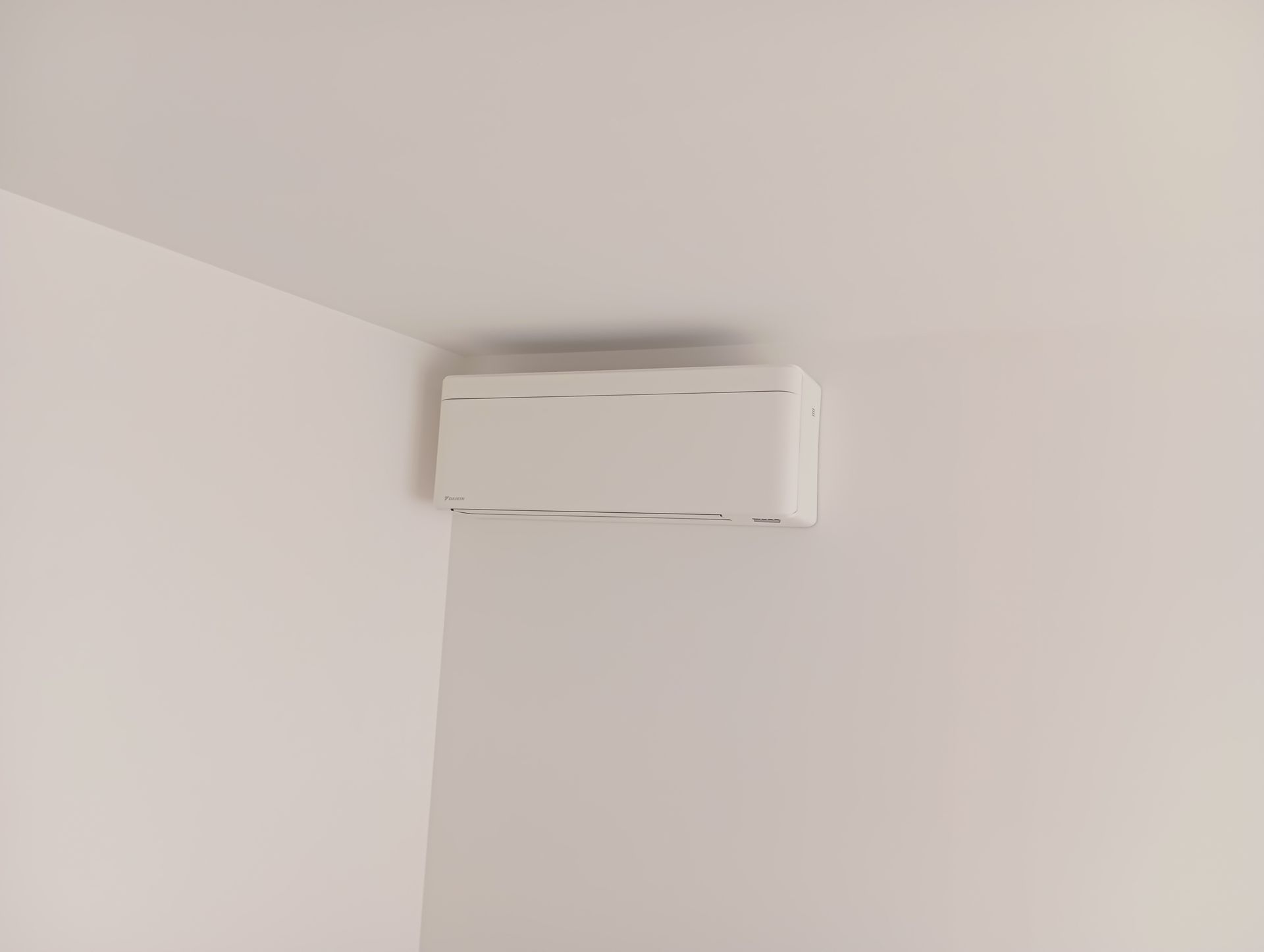 Climatiseur blanc monté sur un mur blanc dans le coin d'une pièce