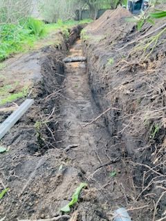 Réalisation d'un drain, tranchée