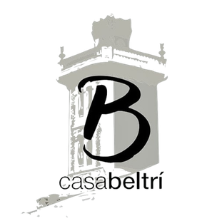 Un logotipo en blanco y negro de un edificio con la letra b en él.