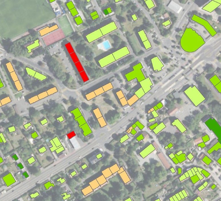 Un compteur de gaz avec des tuyaux jaunes attachés.