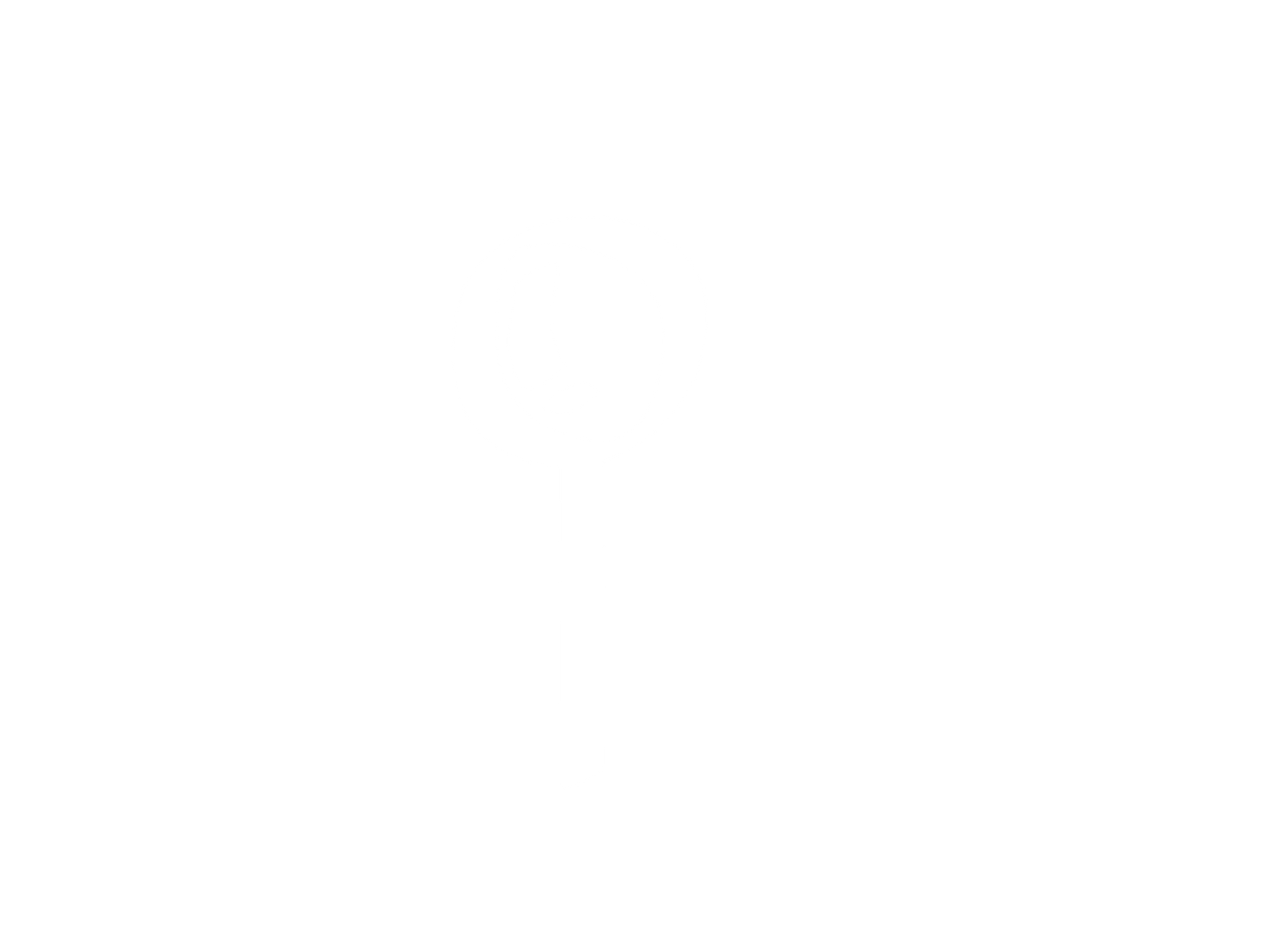 Un estante vertical de madera exhibe seis bufandas coloridas y estampadas que cuelgan de ganchos individuales.