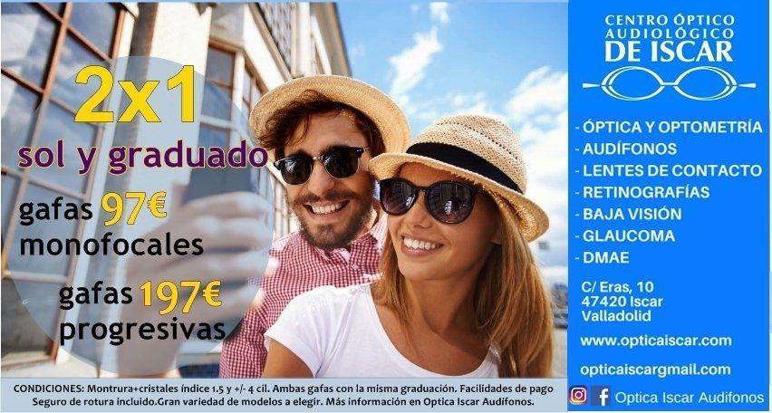 Un hombre y una mujer con sombreros de paja y gafas de sol.