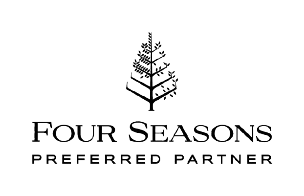 Logo du partenaire privilégié de Four Seasons avec un arbre stylisé au-dessus du texte
