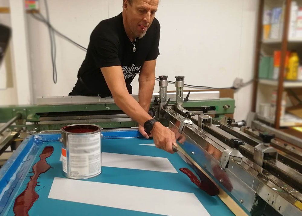 Ainasprintin logo majakasta lähtee valoa ympyrälogoon