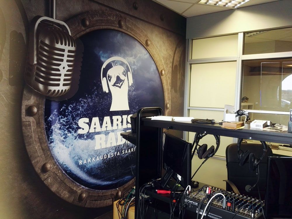 Ainasprintin logo majakasta lähtee valoa ympyrälogoon