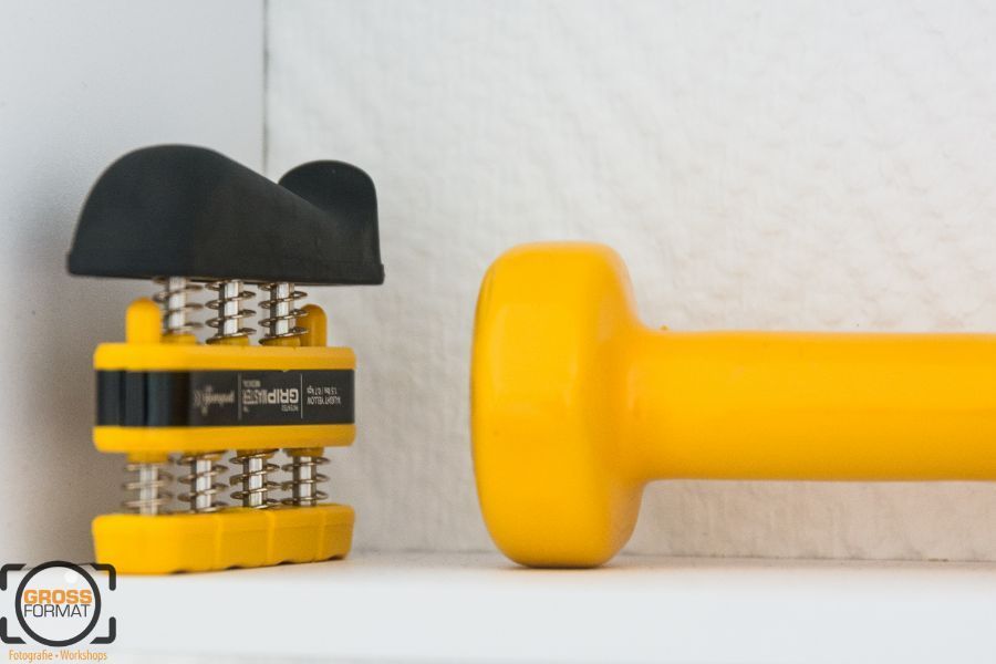 gelbe Hantel und Griffstärkungsgerät