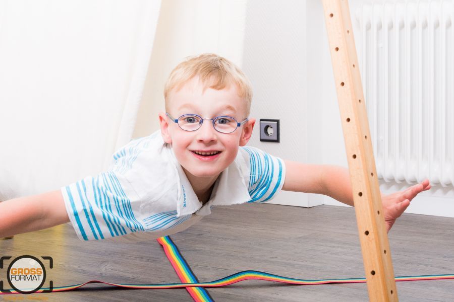 Kind in einem Hängetuch