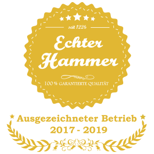 Ein Aufkleber mit der Aufschrift Echter Hammer darauf