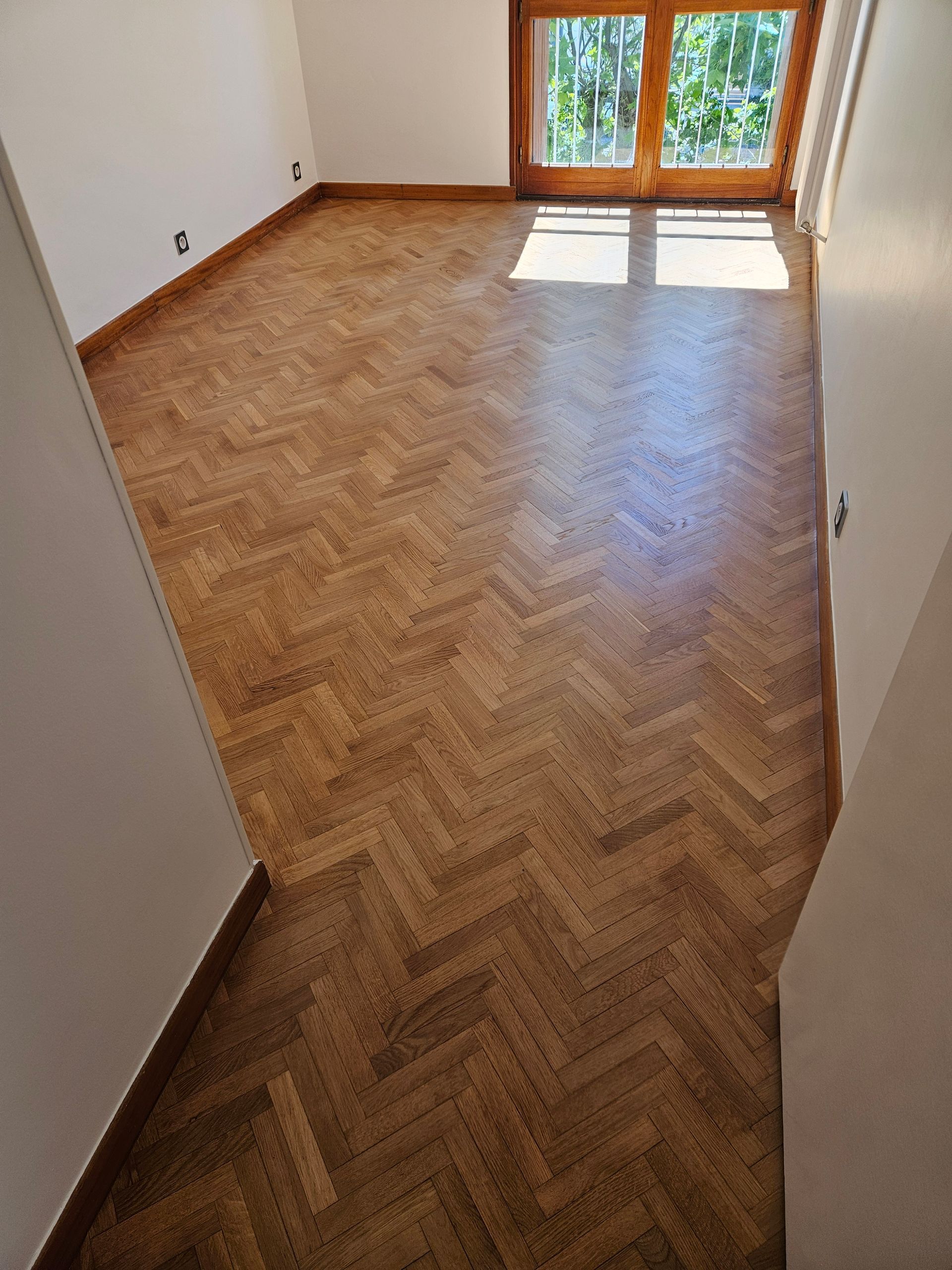 Parquet à chevrons après ponçage et vitrification