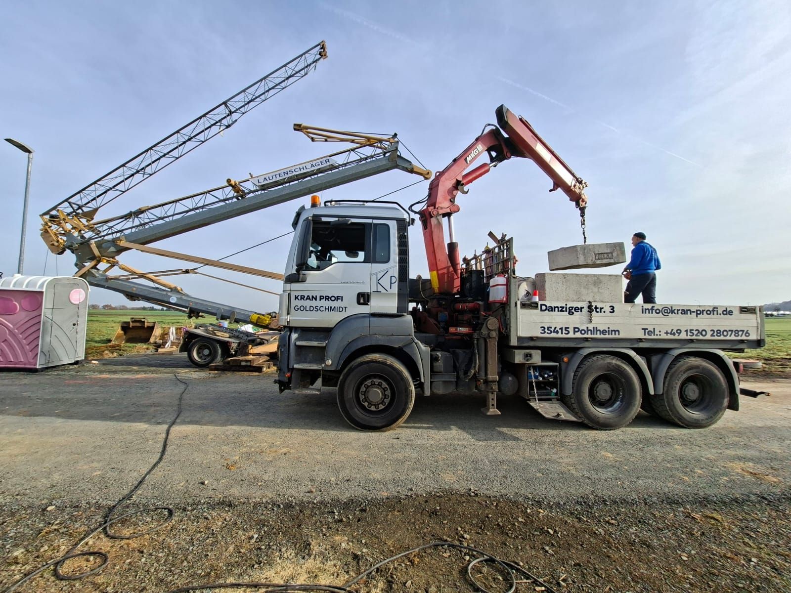 Kran-Profi Goldschmidt - Großbaustelle mit sechs Baukränen, Sonnenuntergang