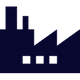 Un icono azul oscuro que representa un edificio de fábrica con dos chimeneas y tres ventanas cuadradas.