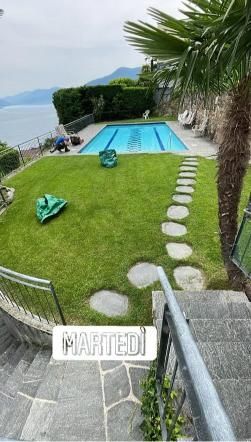 Giardino con ciottoli e piscina - Casagest Facility Management