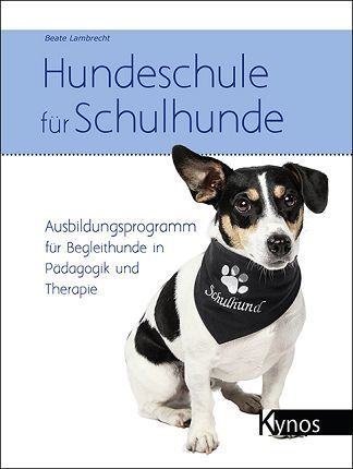 Auf dem Cover eines Buches ist ein schwarz-weißer Hund mit einem Halstuch zu sehen.
