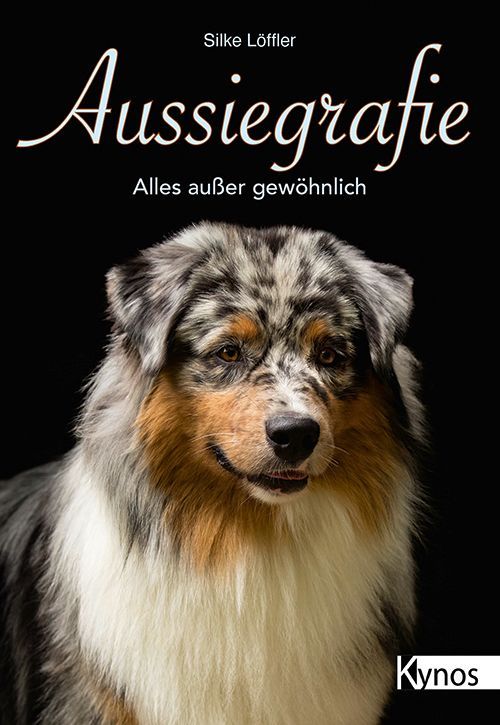 Eine Nahaufnahme eines Hundes auf dem Cover eines Buches.