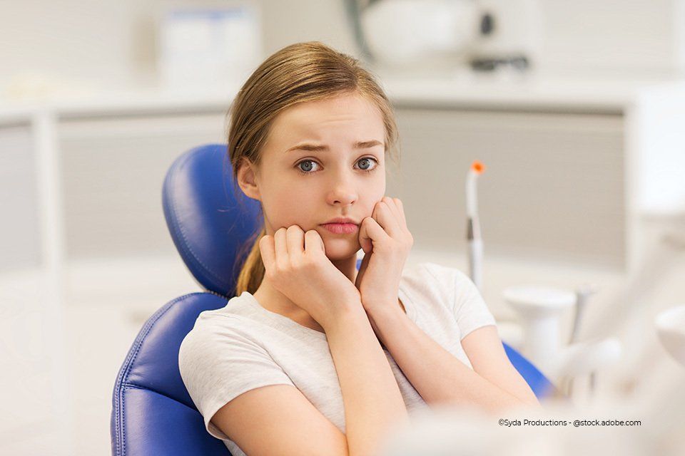 Kind mit Angst beim Zahnarzt