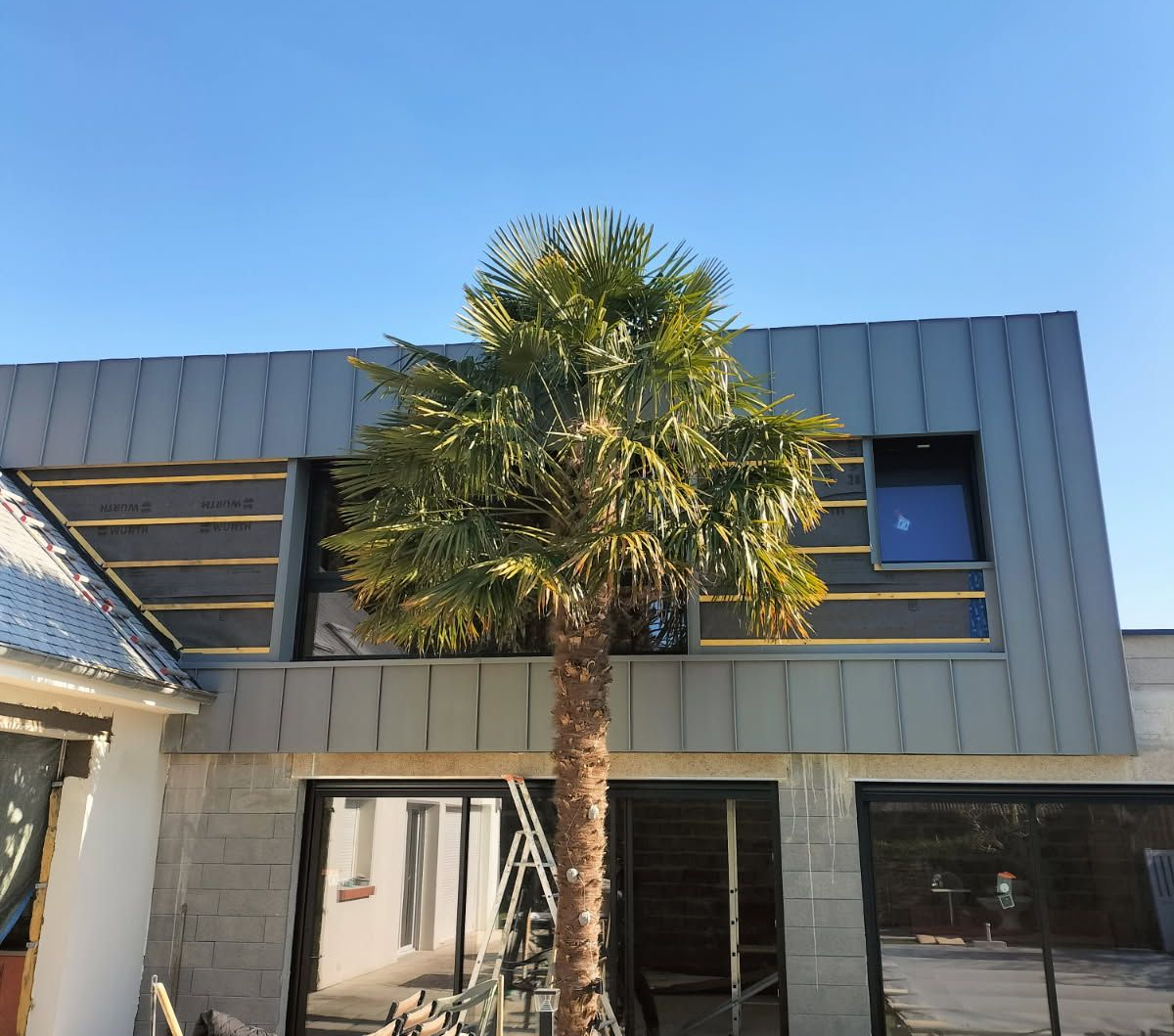 habillage complet du bardage en zinc a joint debout