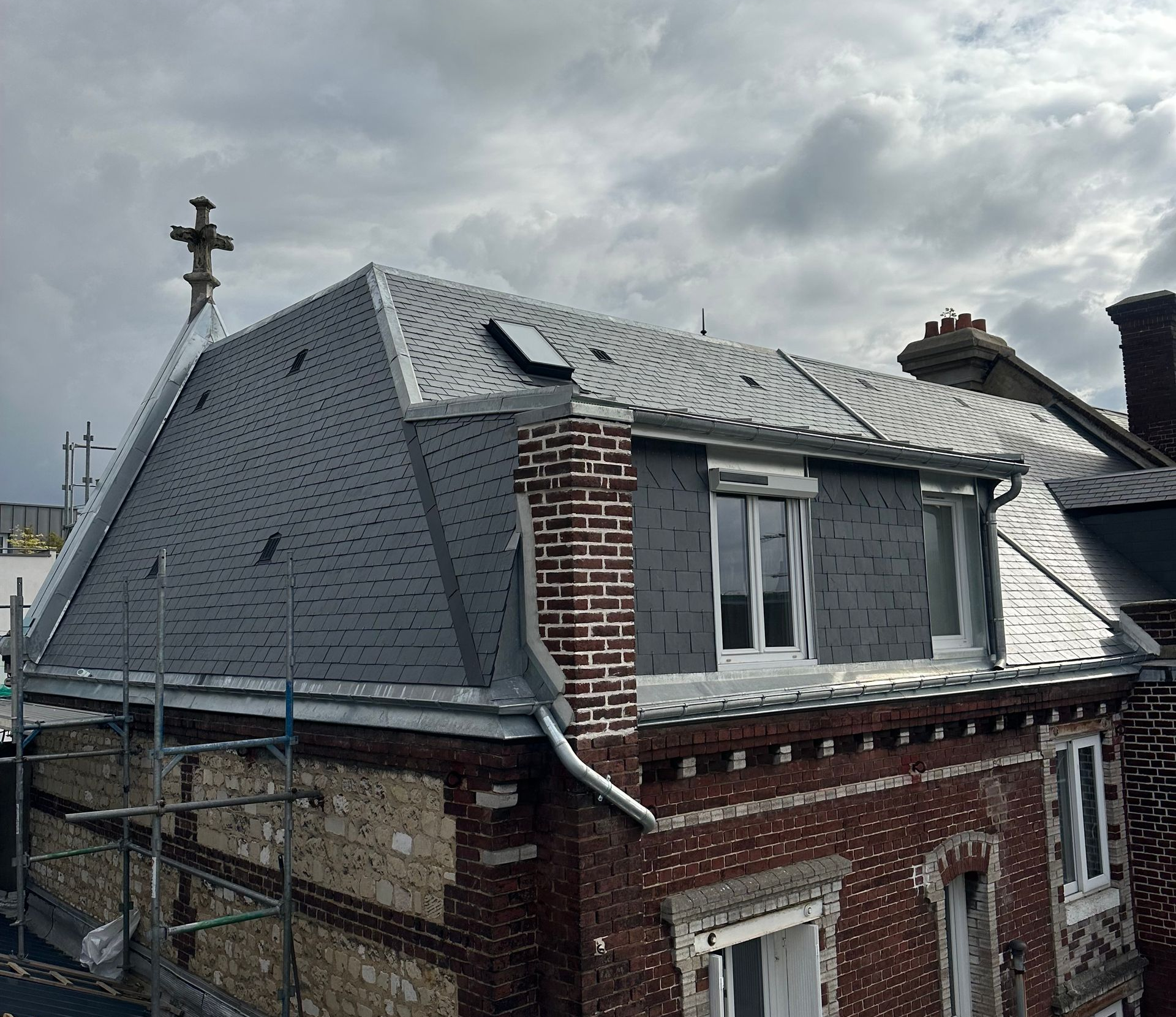 Nettoyage et peinture de toiture