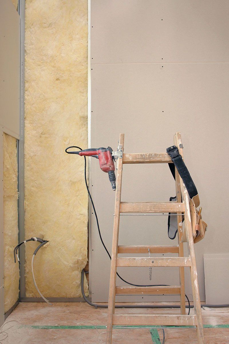 Construction d'une cloison avec un isolant