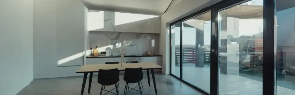 Cocina moderna con salpicadero de mármol.