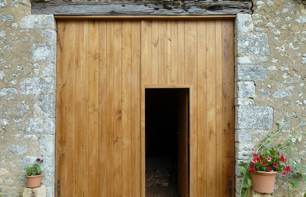 Porte d'entrée avec bardage en bois