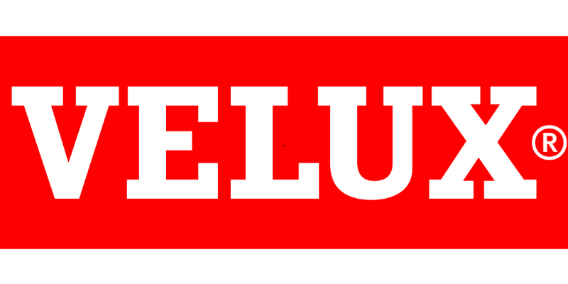 Logo VELUX en blanc sur un rectangle rouge.