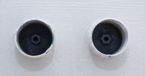 Vesiliitännät seinässä