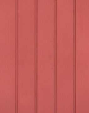 Punainen, puinen lautaseinä