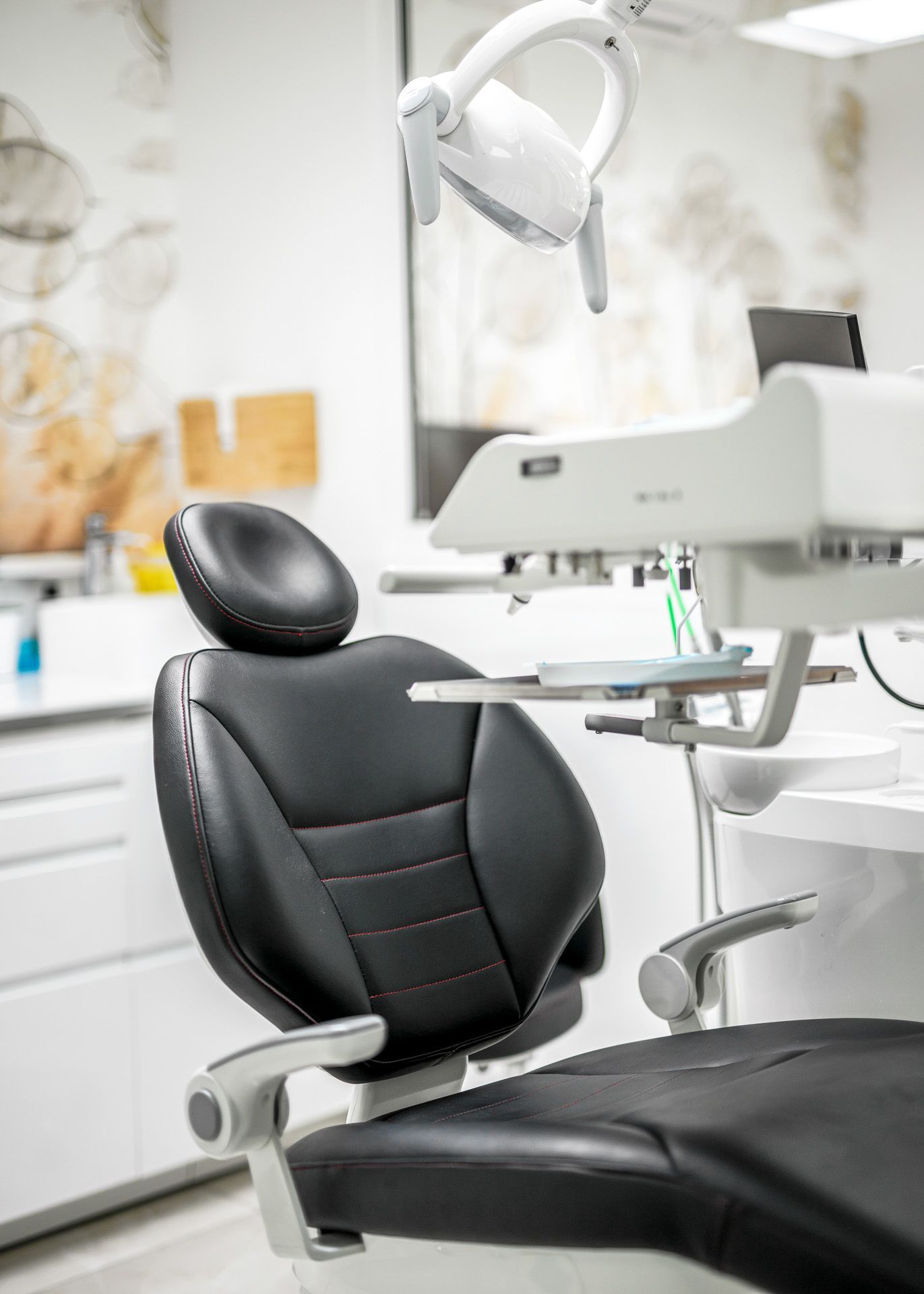 Assise noire d'un siège d'orthodontiste