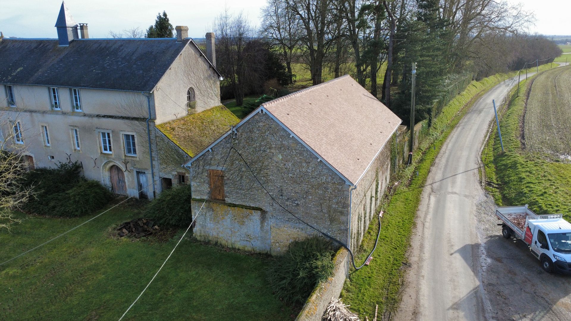 Rénovation d'un toit en tuiles.