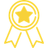 Une icône de médaille d'or avec une étoile à cinq branches au centre et deux rubans qui pendent.